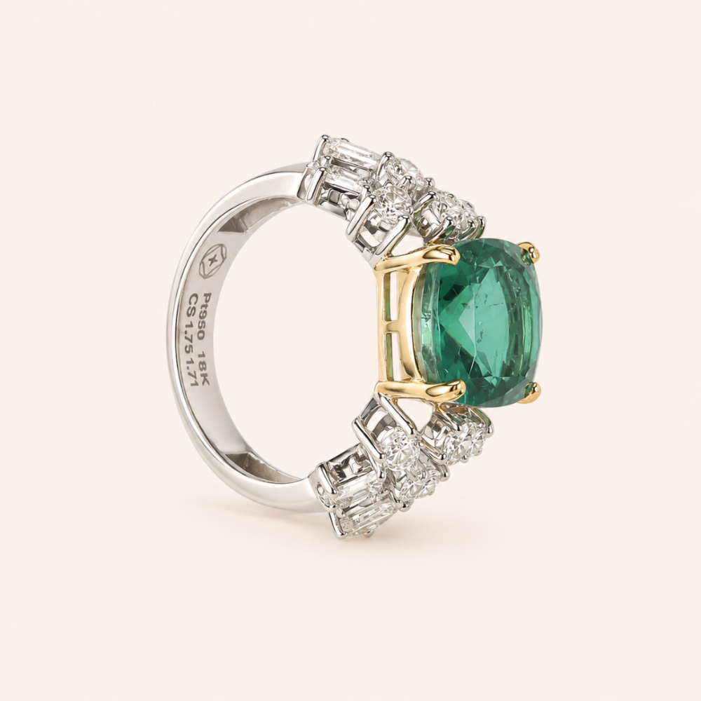 Radiating elegance and timeless charm, the Elegant Green Stone Ring features a captivating green center stone surrounded by a halo of sparkling lab-grown diamonds. Designed to make a statement, this sophisticated piece combines vibrant color, exceptional brilliance, and refined craftsmanship, making it perfect for special occasions or adding a touch of luxury to everyday style.