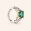 Radiating elegance and timeless charm, the Elegant Green Stone Ring features a captivating green center stone surrounded by a halo of sparkling lab-grown diamonds. Designed to make a statement, this sophisticated piece combines vibrant color, exceptional brilliance, and refined craftsmanship, making it perfect for special occasions or adding a touch of luxury to everyday style.